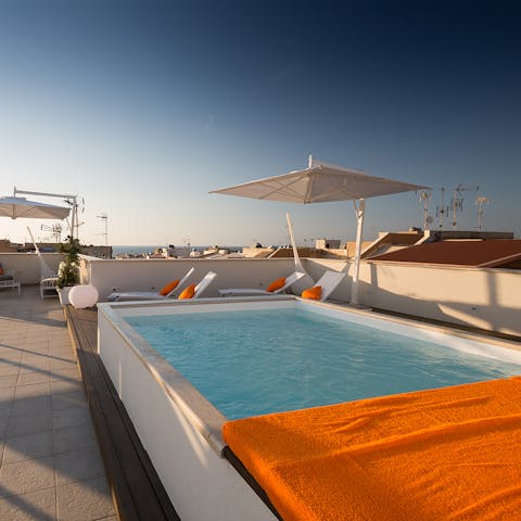 Relax on the building's shared rooftop