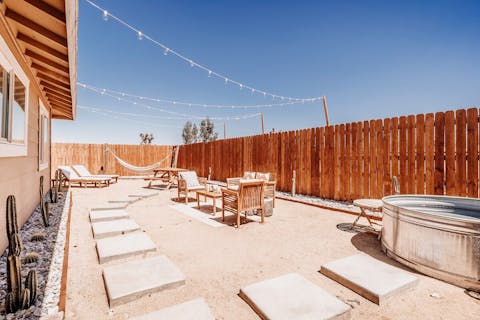 Relax on a sun lounger or hammock in your tranquil backyard