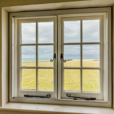 Watch the waves rolling in from the home's picture windows