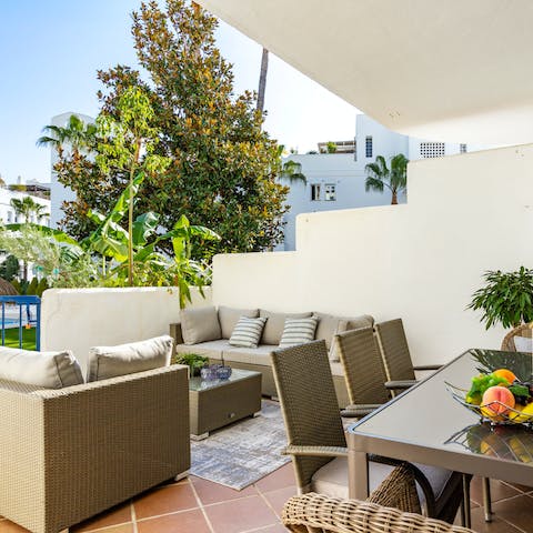 Dine alfresco on your terrace dappled with greenery