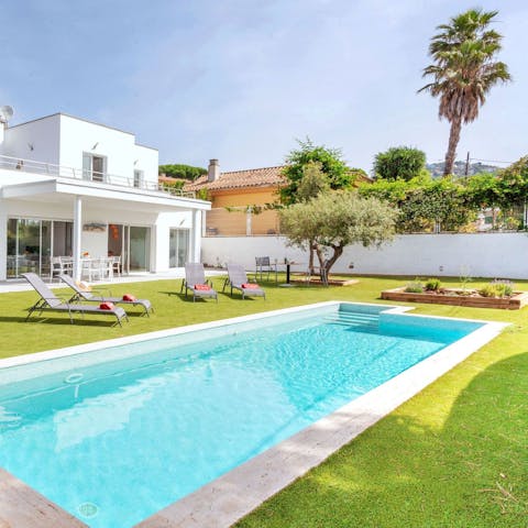 Dive into the inviting waters of your own private swimming pool