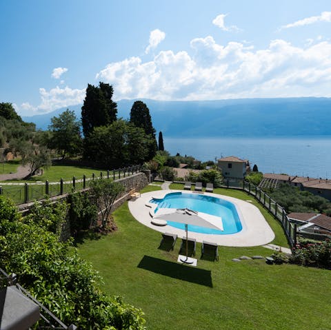 Enjoy your own private pool with views of the lovely lake
