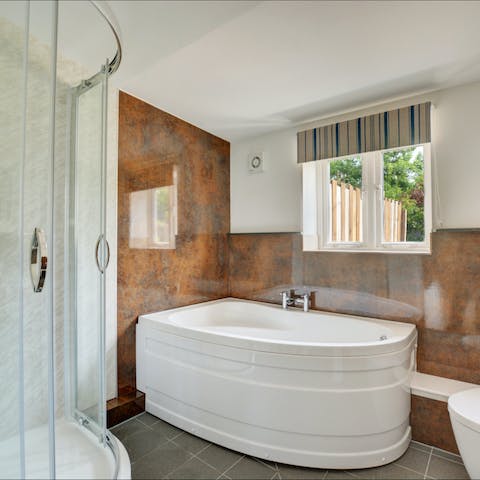 Treat yourself to a long soak in the corner tub after a day in the great outdoors