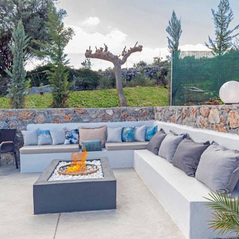 Get a fire roaring in the fire pit and spot stars in the night sky