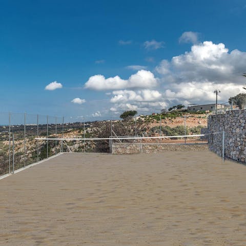 Pad down to the beach volleyball court for a sunny game or two