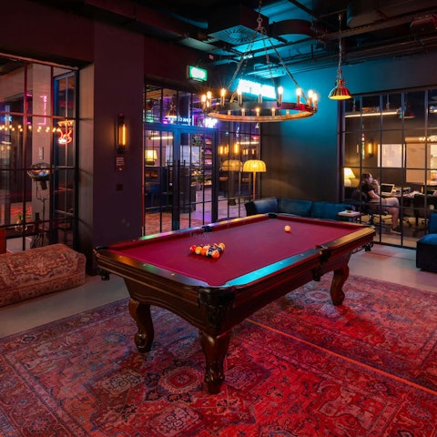 Unwind with friends and fellow guests in the games room