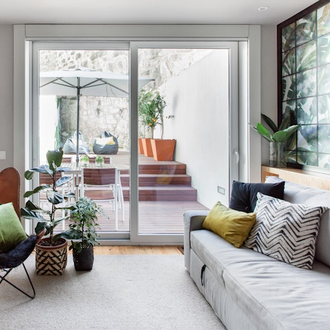 Throw open the glass doors in the living room and let a cooling breeze circulate inside