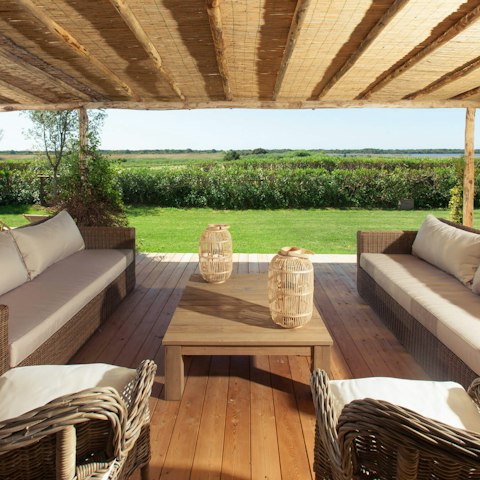 Share a bottle of local wine on the terrace as the kids play in the garden