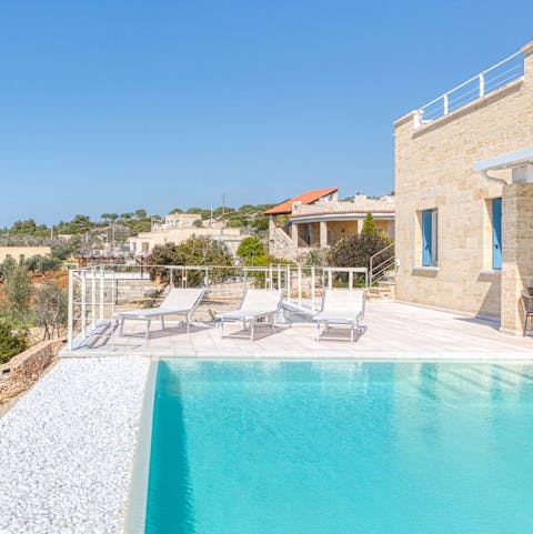 Soak up the sun from in or beside the private infinity pool