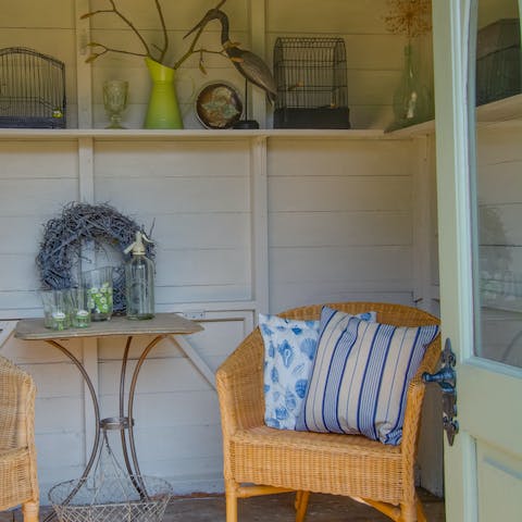 Sneak away to the summer house for a cheeky siesta
