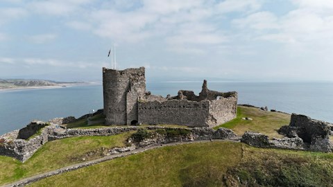 Discover Wales's dramatic medieval castles perched above the coastline