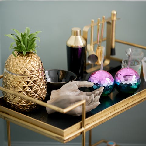 Pour yourself a cocktail at the drinks cart
