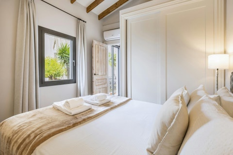Enjoy the glimpse of the Church of Our Lady of Loreto from the bedroom