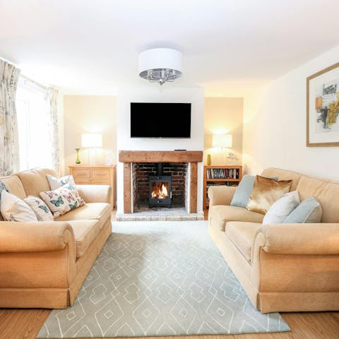 Take your pick from two sitting rooms to curl up in