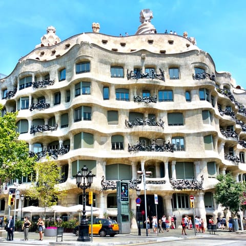 Take the fifteen minute walk to Casa Milà on the famous Passeig de Gràcia