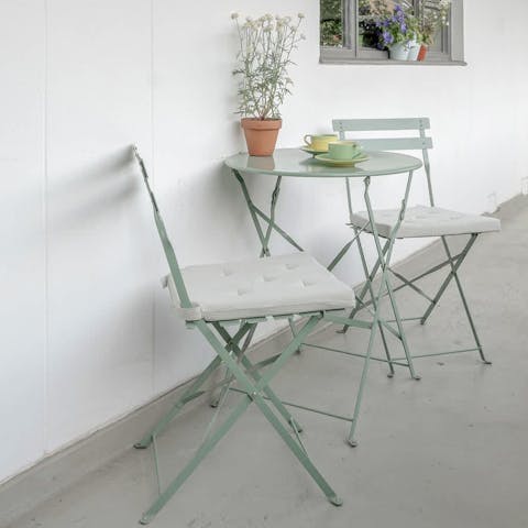 Enjoy your morning coffee at the outside table