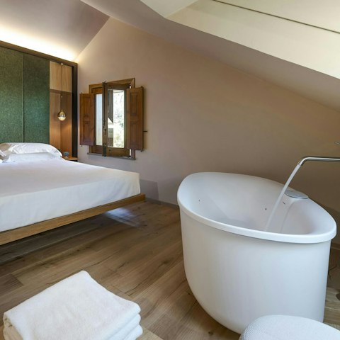 Soak in the bathtub right in the comfort of your bedroom