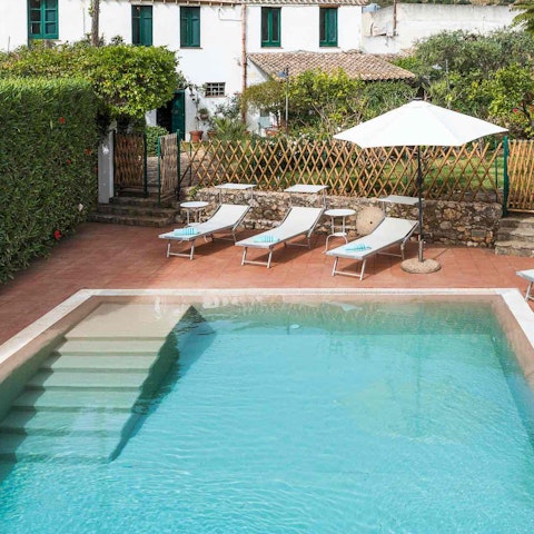 Spend serene days stretched out by the pool