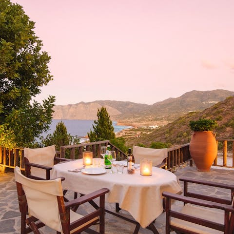 Admire the stunning views at sunset, as you enjoy a meal on your private terrace