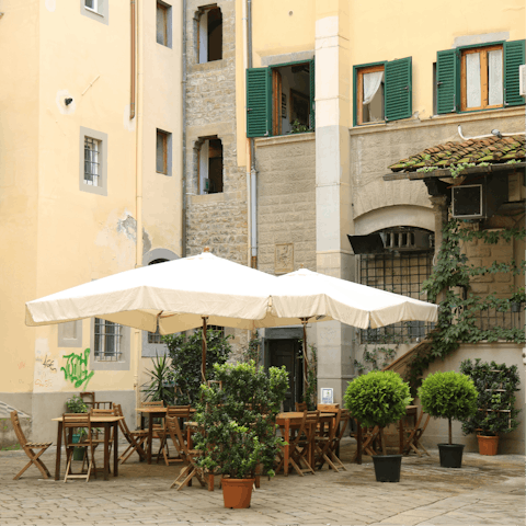 Soak up the atmosphere from a local restaurant