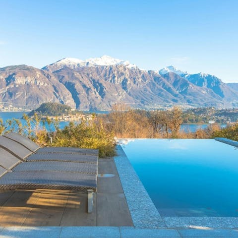 Experience total relaxation while lounging by the pool