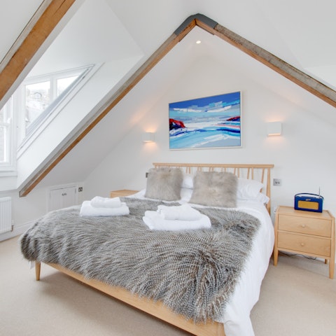 Snuggle up in the sumptuous king-size bed and drift off into a deep sleep