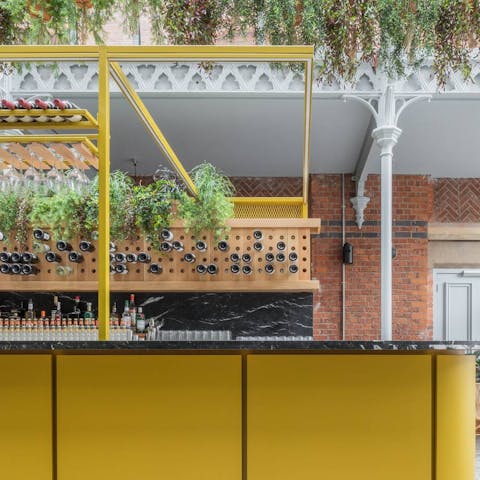 Sip on a drink at the building's very own bar