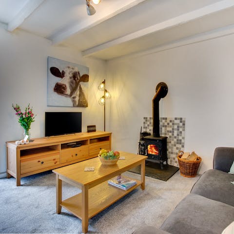 Curl up by the wood-burning stove with a glass of wine and good book