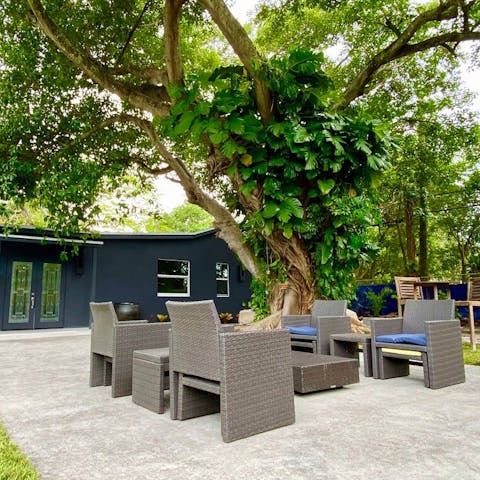 Enjoy a cup of coffee under shady trees