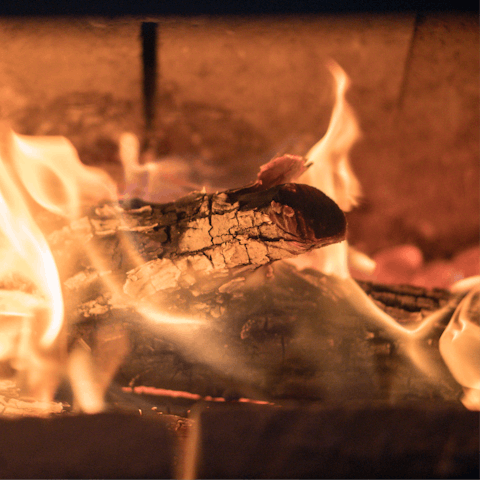Cosy up with a fire in the wood-burning stove when the temperature dips