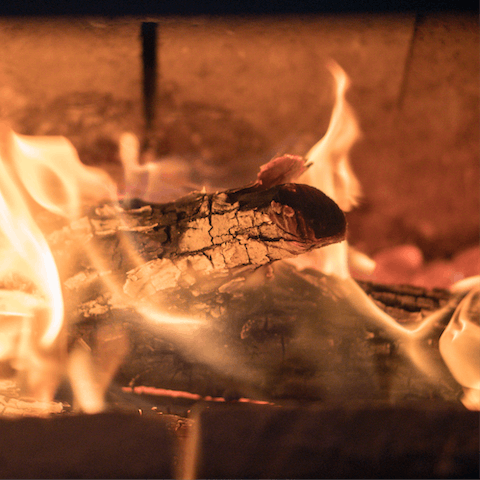 Cosy up with a fire in the wood-burning stove when the temperature dips