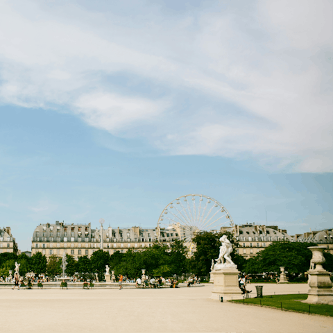 Stroll to the Tuileries for a morning coffee among fountains and sculptures