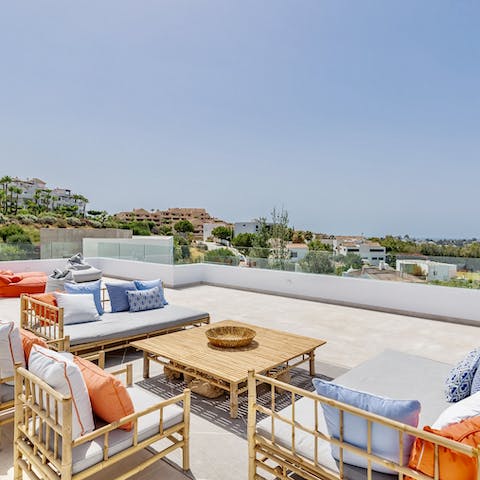 Savour sunset drinks and hilltop views on the roof terrace