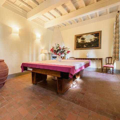 Ask your host to use the full-size pool table inside