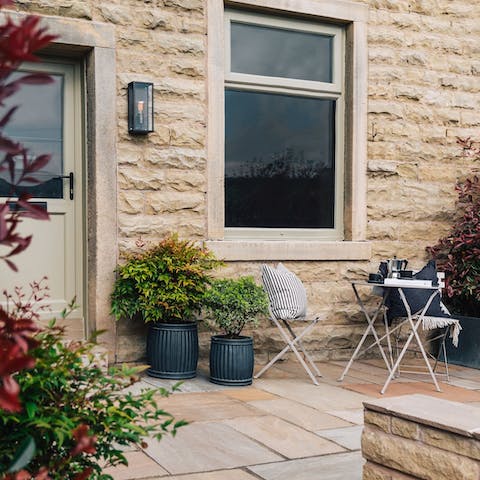 Savour a quiet morning coffee on the private patio