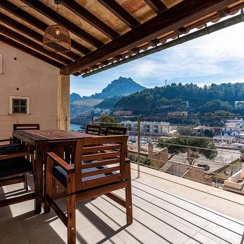 Sip a sangria and enjoy views of the mountains and sea