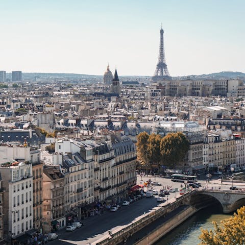 Visit the Champ de Mars and the iconic Eiffel Tower, within walking distance