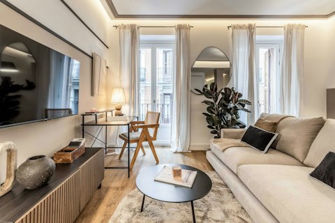 Unwind in a light-filled space with views over Madrid