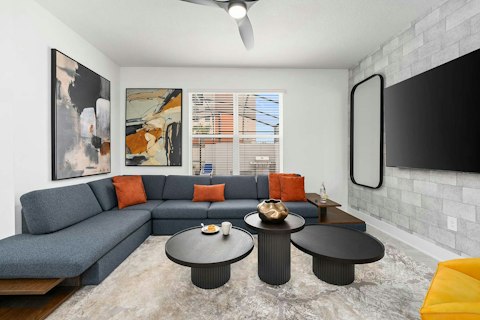 Kick back in a bold, art-filled living space after a theme park day