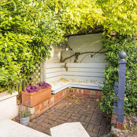 Enjoy a glass of local ale in the garden nook