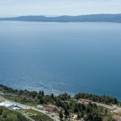 Drive along the coastline to reach nearby cities and The Krka National Park