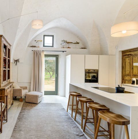 Nibble on antipasti in the well-appointed kitchen