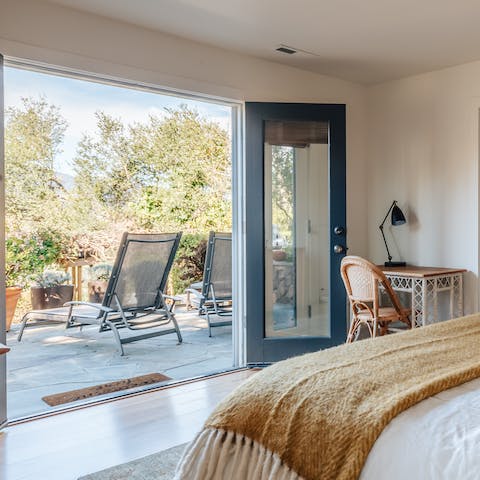 Open the patio doors and watch the sunrise from your bed