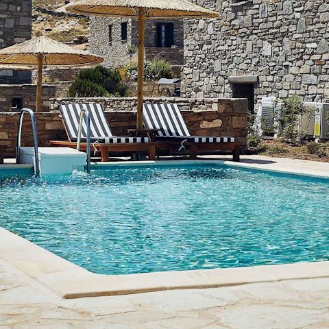 Cool off from the Cycladic sun in the swimming pool