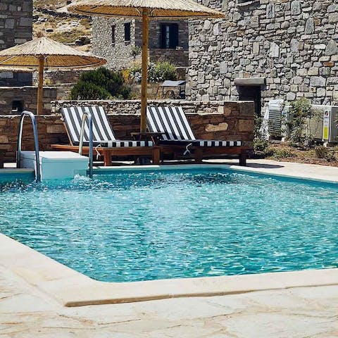 Cool off from the Cycladic sun in the swimming pool