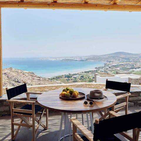 Dine alfresco while taking in spectacular views of the Aegean Sea