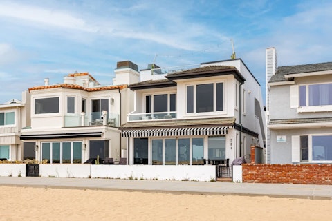 Walk straight from the Newport Beach sand to your private patio
