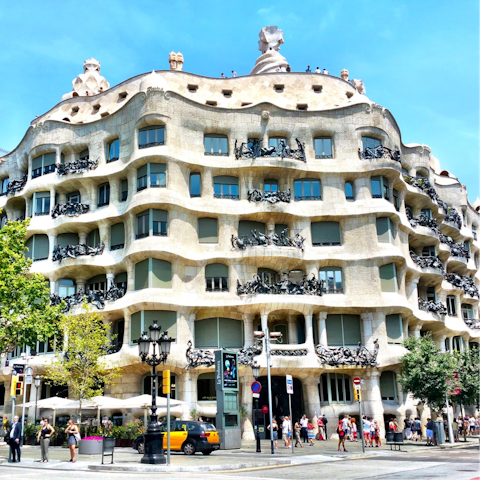 Head to Casa Mila in the L'Eixample district, within walking distance