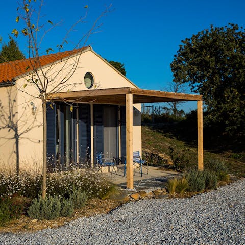 Watch the sun set over the Aegean Sea from one of the verandahs