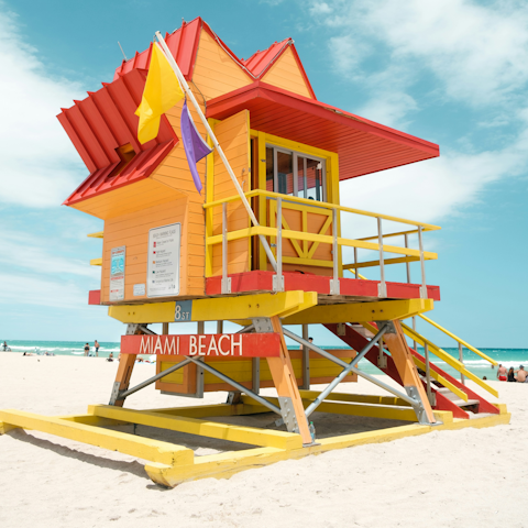 Sunbathe on the sand at the iconic Miami beach